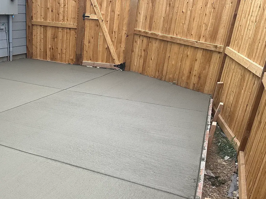 Cedar privacy fence and gate enclosing a residential back yard